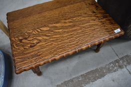 A mid 20th Century oak low occasional table of small proportions