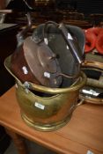 A brass coal helmet, pewter tray and copper kettle