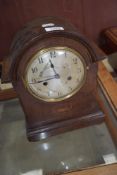 An early 20th Century oak cased mantel clock