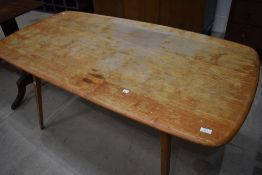 A vintage Ercol style kitchen dining table (af)