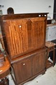 A reproduction Regency style mahogany bureau/cocktail cabinet