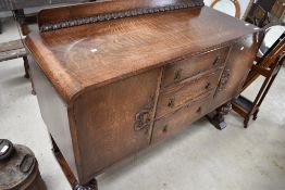 An early 20th Century oak sideboard