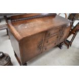 An early 20th Century oak sideboard