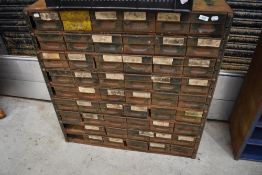 A selection of metal parts or similar drawers
