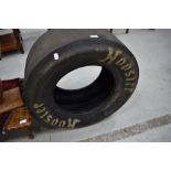 A racing car tyre, possibly drag related , Hosier