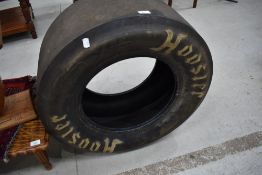A racing car tyre, possibly drag related , Hosier