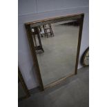 A modern gilt framed wall mirror