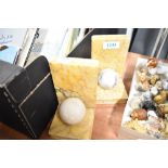 A pair of Art Deco era Onyx book ends with ball decoration.