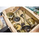 A selection of vintage brass wares including sauce pan, candle stick, poker holder and ash brush