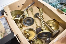 A selection of vintage brass wares including sauce pan, candle stick, poker holder and ash brush