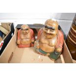 Two 20th century wooden carved Buddha figures by JIG.