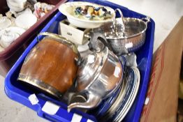 A selection of ceramics a biscuit barrel and silver plated part tea set