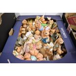 A selection of vintage figures and figurines including Moorcraft and Pendelfin