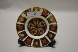 A modern Royal Crown Derby small size plate in an Imari design 1128