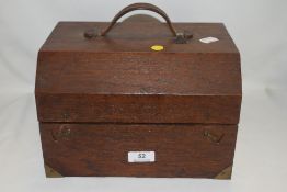 An antique doctors or vets case in mahogany with brass banding and folding top