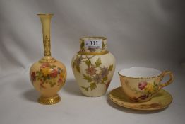 Three pieces of Royal Worcester including tea cup and saucer, scalloped vase with hand painted