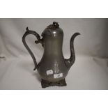 A James Dixon pewter tea of coffee pot with ivy leaf design handle spout and feet