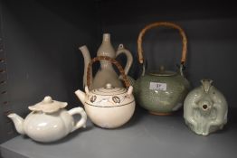 A selection of oriental and Vietnamese ceramics including Celadon glaze teapot, Ewer and posy vase