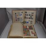 Two pairs of early 20th century philatelic stamp collectors albums