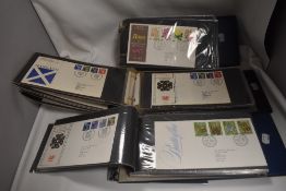 Three modern first day cover philatelic stamp albums
