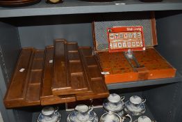 A 20th century Chinese Mah-Jong game set with wooden counter boards