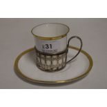 An early 20th century Shelley coffee cup and saucer with a HM silver holder AF