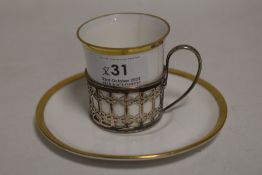 An early 20th century Shelley coffee cup and saucer with a HM silver holder AF