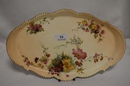 A 20th century Royal Worcester blush ivory tray bearing green stamp decorated with flowers