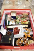 A box of vintage and retro jewellery including brooches, amber earrings, Art Deco paste buckle and