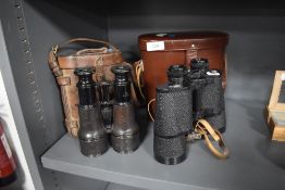 A pair of Carl Zeiss 10x50W binoculars with case and an earlier pair marked S3 Z6537