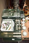A selection of Portmeirion Botanical cutlery and table cloths
