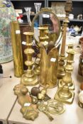A selection of vintage brass, to include shell cases, lamp base, dressing table mirror and more.