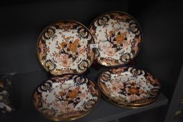 A set of six 19th century Royal Crown Derby dinner plates in Imari designs bearing painted red crown