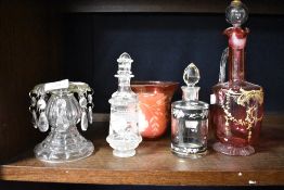 A selection of early 20th century hand decorated glass wares including scent bottles, cranberry