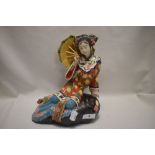 A Wanzpits Chinese Shi Wan porcelain figurine of a seated geisha