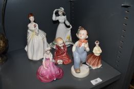 Seven modern figures and figurines including Royal Dux, Royal Doulton and Coalport