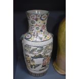 A large floor standing vase possibly 20th century with an earthen ware body and incised decoration