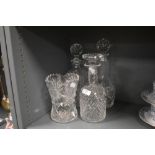 Three modern clear cut crystal glass decanters including Stuart and a similar Bohemian vase