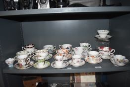 A selection of antique and later tea cup and saucer sets including Worcester Chamberlain, Lustre and