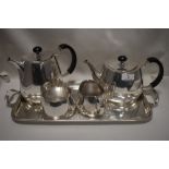 A 20th century Walker and Hall tea set and tray in a modernist design