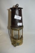 An antique miners lamp by Naylor Wigan marked WC&Icol