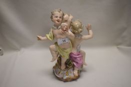 An antique porcelain Meissen figure group of cherubs or Putti, bearing mark to base and 1338, 35.40