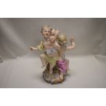 An antique porcelain Meissen figure group of cherubs or Putti, bearing mark to base and 1338, 35.40