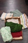 An assortment of vintage curtains, throws and fabrics, various eras and styles.