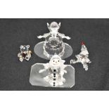 Four modern Swarovski silver crystal glass figurines including Snowman, Clown and Angel