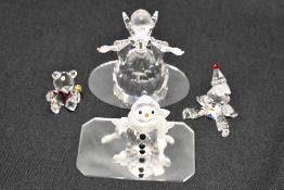 Four modern Swarovski silver crystal glass figurines including Snowman, Clown and Angel