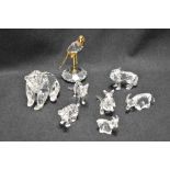 Eight modern Swarovski silver crystal glass studies of wild animals including bears, wolfs, kangaroo