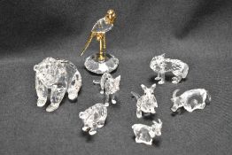 Eight modern Swarovski silver crystal glass studies of wild animals including bears, wolfs, kangaroo