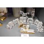 A modern Swarovski silver crystal glass study of a train set with Rocking Horse and Toy Soldier