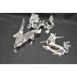 Three modern Swarovski silver crystal glass studies from the Fabulous creatures series including
